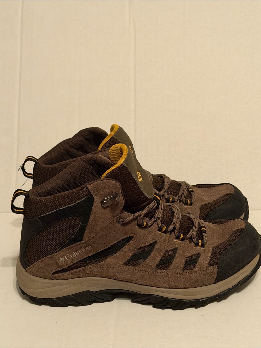 Columbia Men's Brown and Black Hiking Boots with Yellow Accents